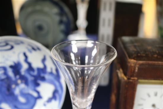 A wine glass, c.1750, with flared bowl, over a knopped airtwist stem, 6.75in.